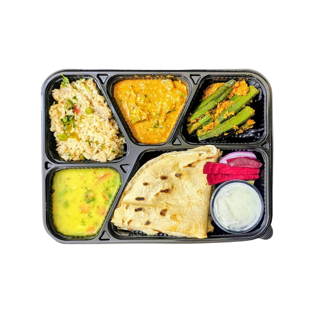 Jeera rice mixed veg curry tiffin Pune